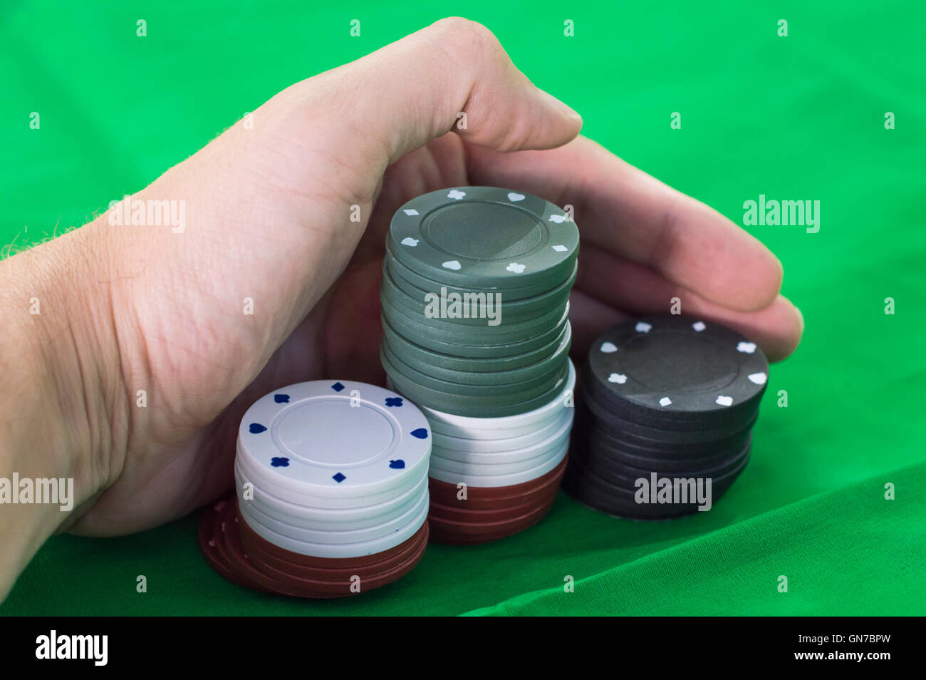 Lucky mano di poker, vincitore prende pesci Foto Stock
