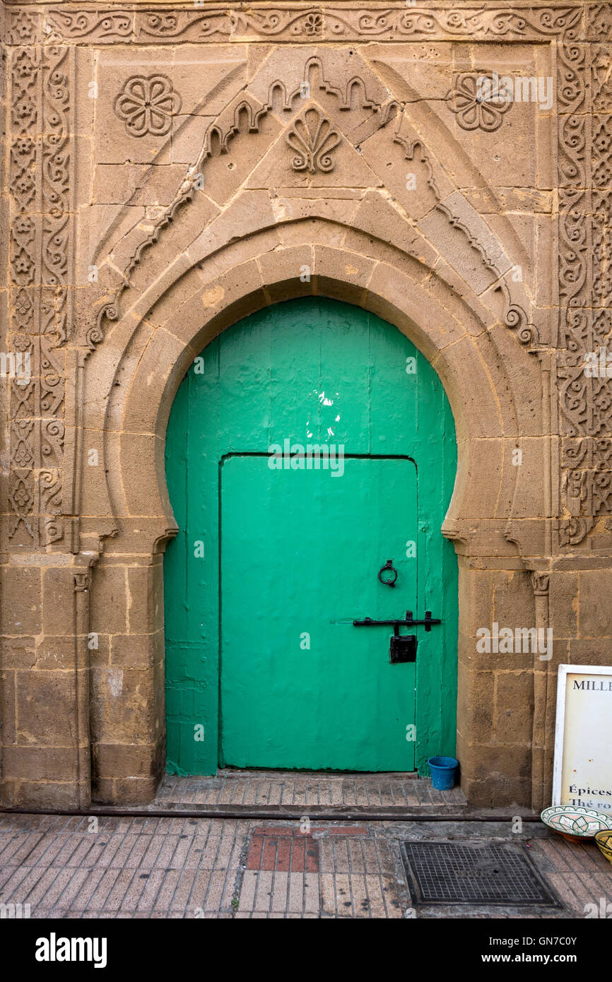 Essaouira, Marocco. Porta e della pietra che intaglia. Foto Stock