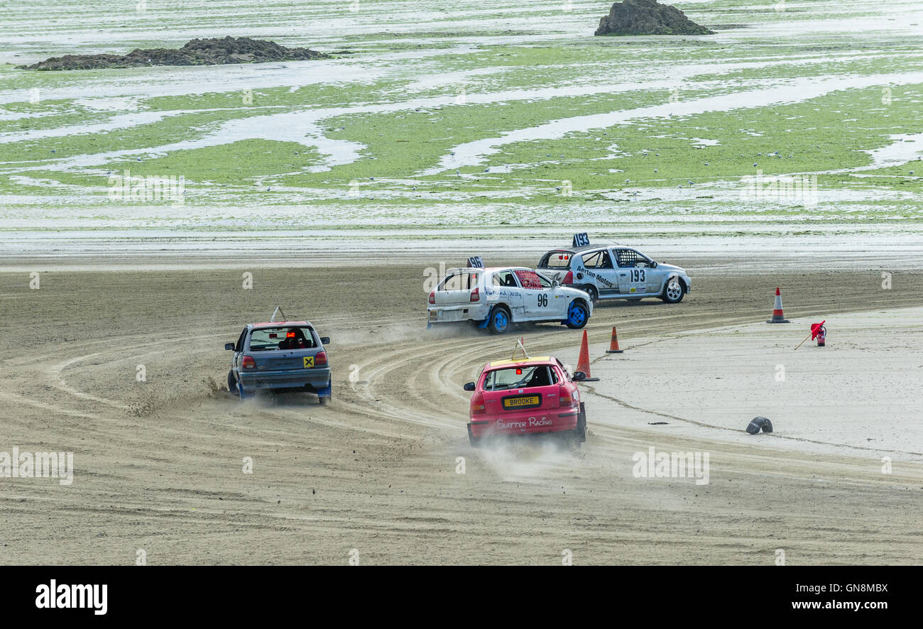 Sabbia racing a St. Aubin's Bay, Jersey. Foto Stock