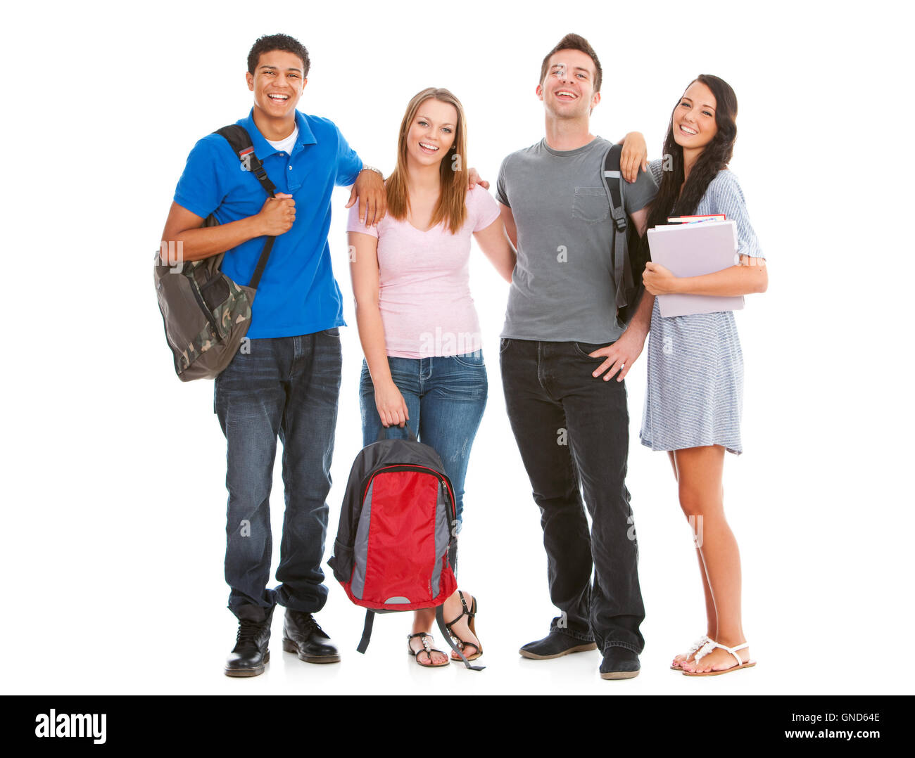 Multi-etnico gruppo di adolescenti con il Caucaso e afro-americano di ragazze e ragazzi in abbigliamento casual. Foto Stock