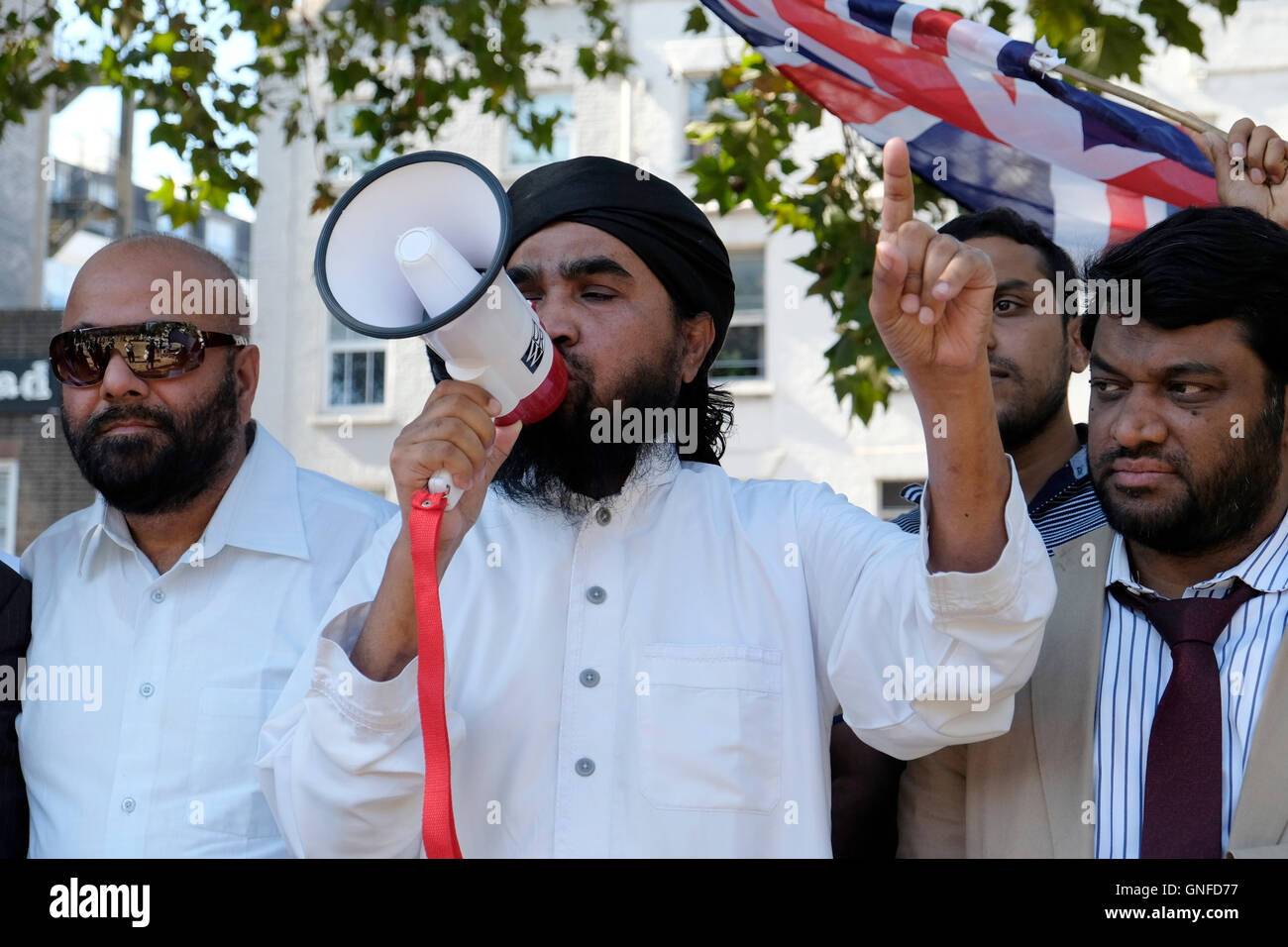 Protesta Bangladeshis nella zona est di Londra contro la pena di morte ha consegnato a Mir Quasem Ali in Bangladesh. Foto Stock