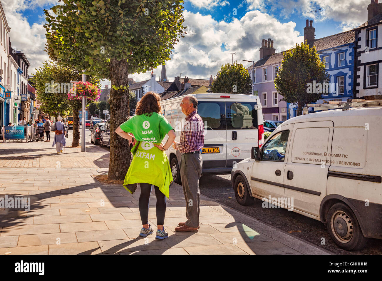 La raccolta per Oxfam in strada a Cockermouth, Cumbria, Regno Unito Foto Stock