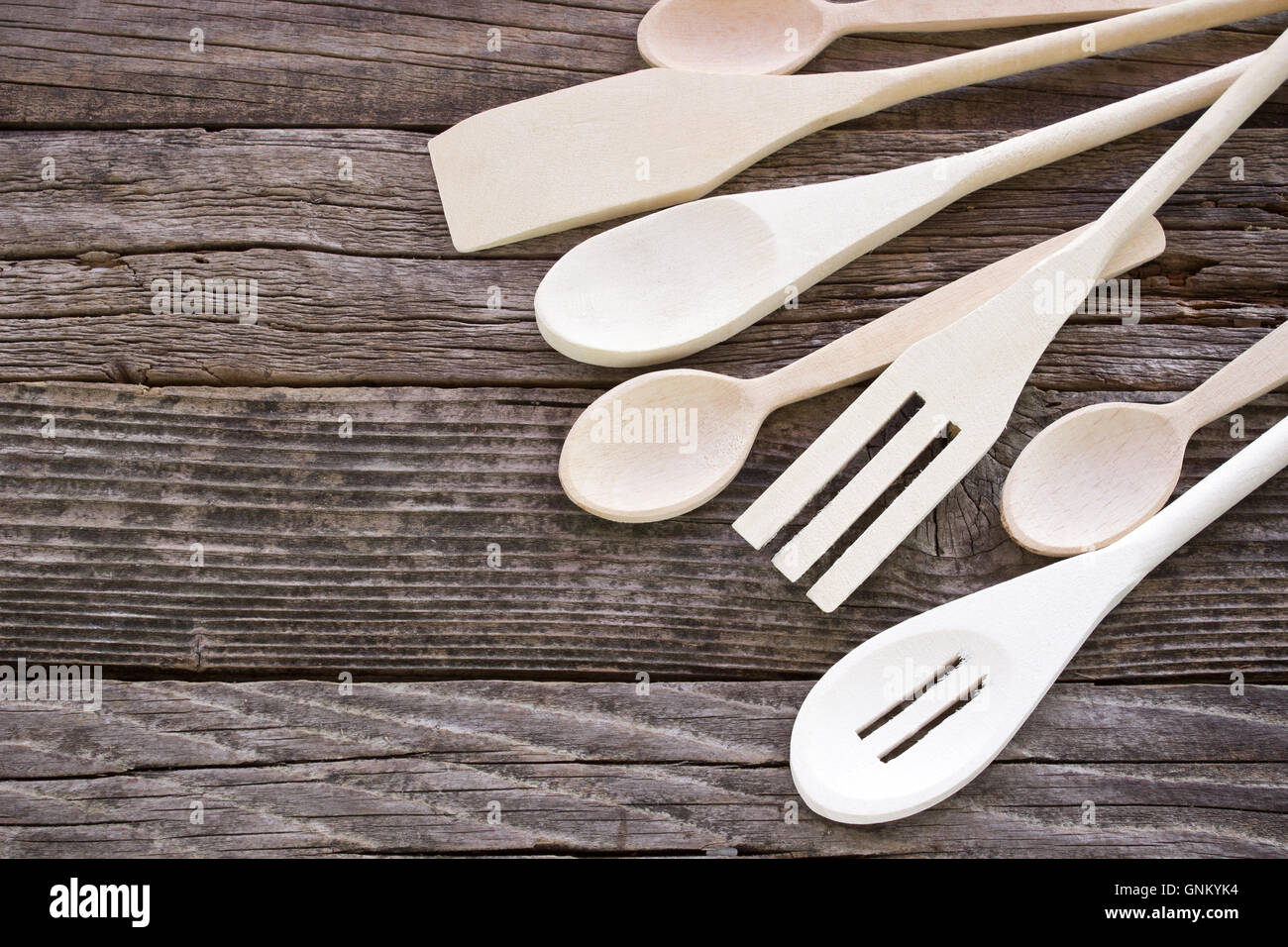 In legno set di posate su sfondo di legno Foto Stock