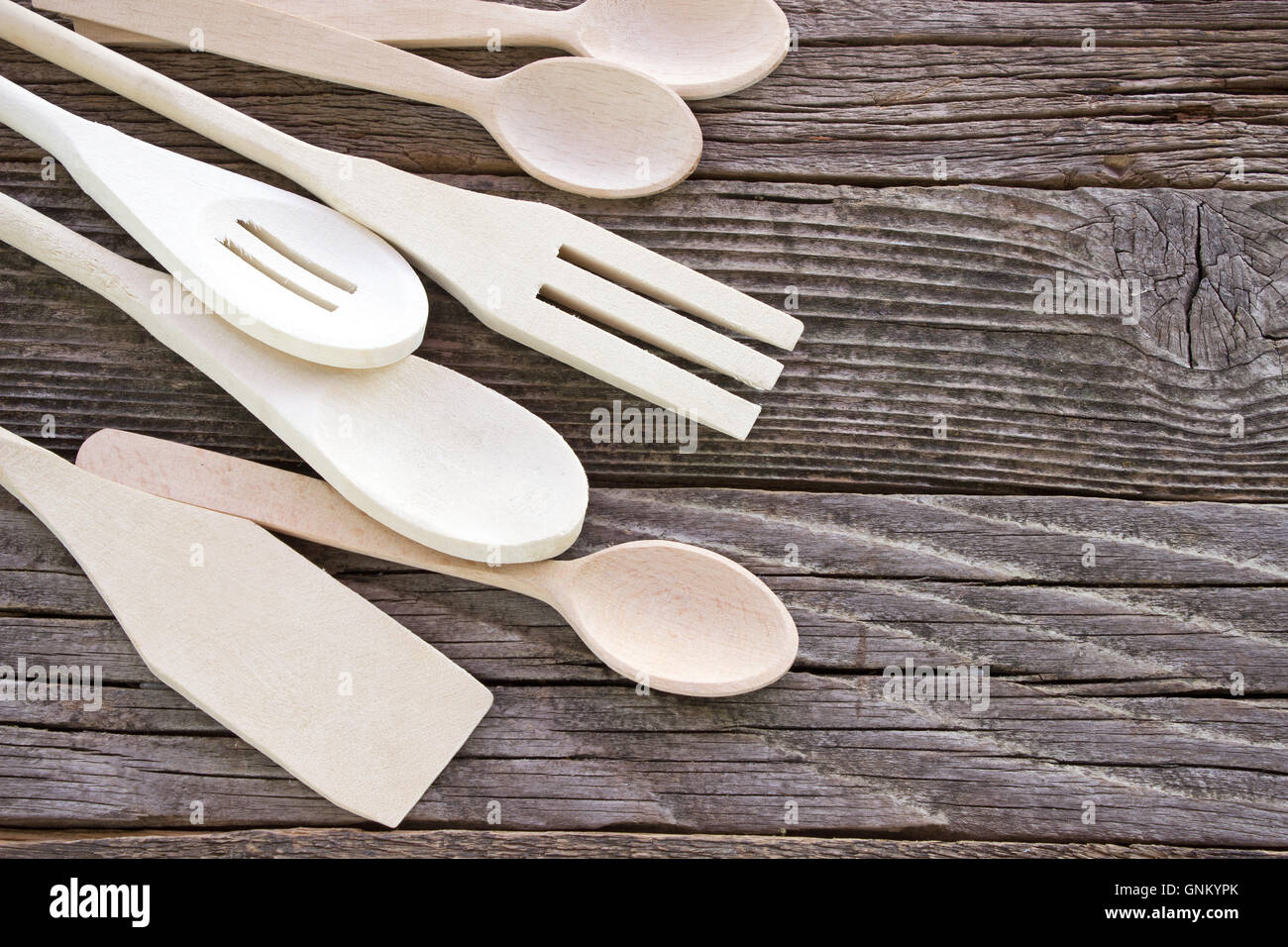 In legno set di posate su sfondo di legno Foto Stock