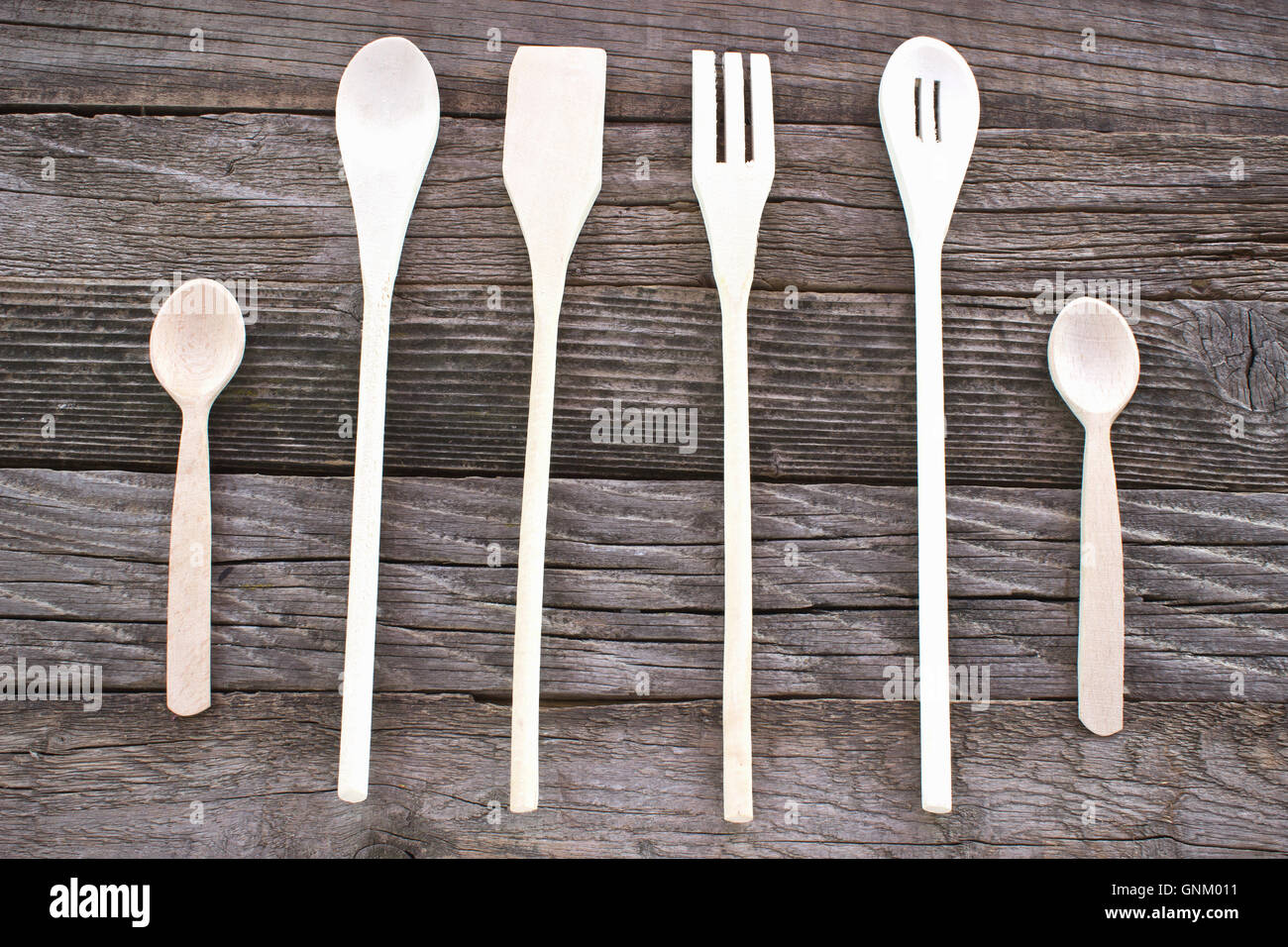 In legno set di posate su sfondo di legno Foto Stock