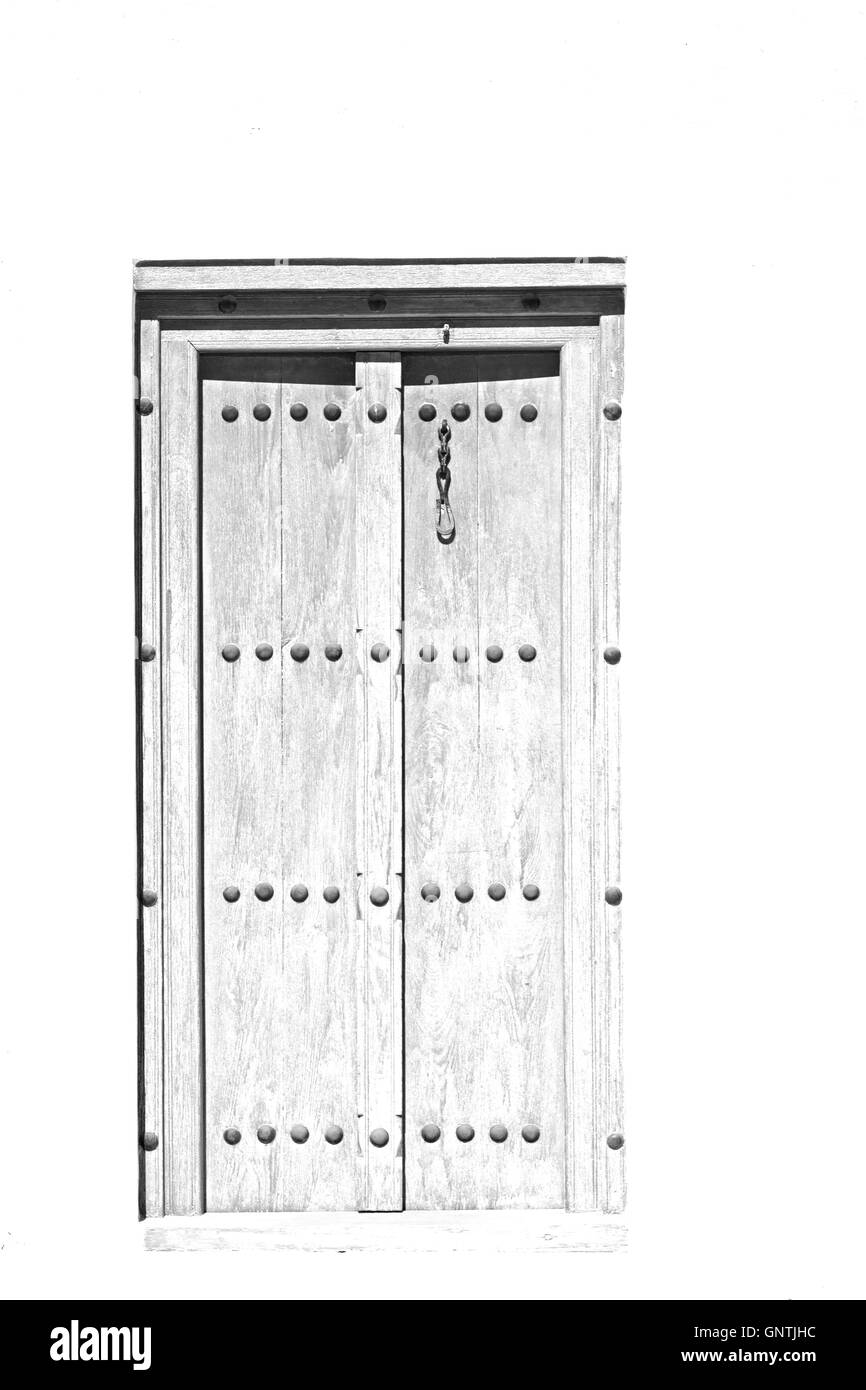 Oman vecchia porta di legno e la parete della casa Foto Stock