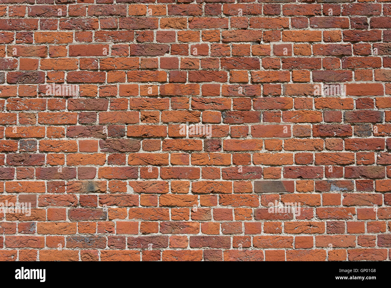 Un muro di mattoni, il Broadway, Laleham, Surrey, England, Regno Unito Foto Stock