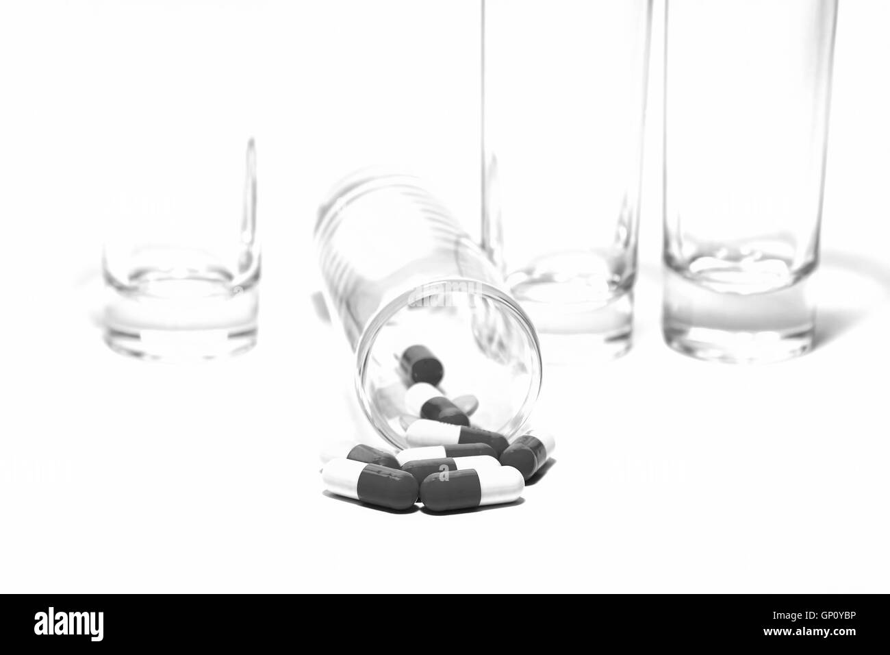 Medicina alternativa capsula cura vicino al sano. Foto Stock