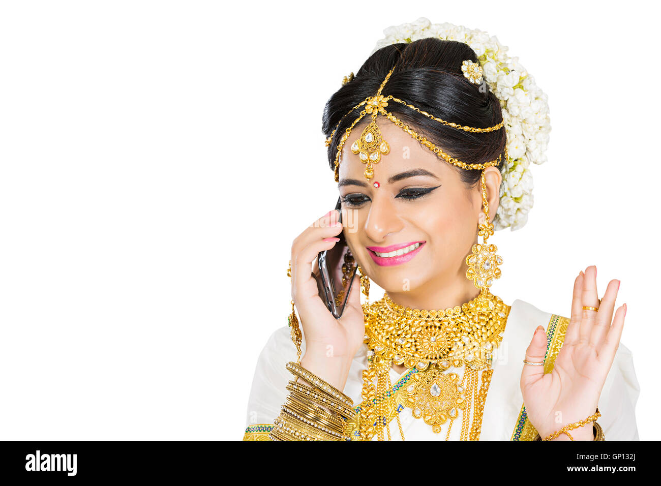 1 Bella Sposa adulti Malayalee donna Diwali parlando del telefono mobile Foto Stock