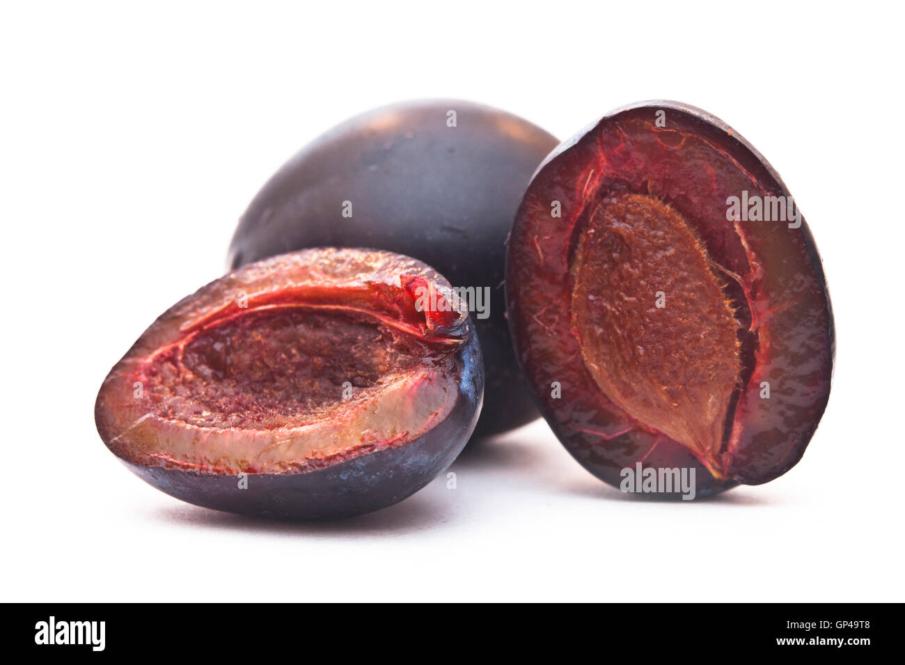 Prugna su sfondo bianco Foto Stock