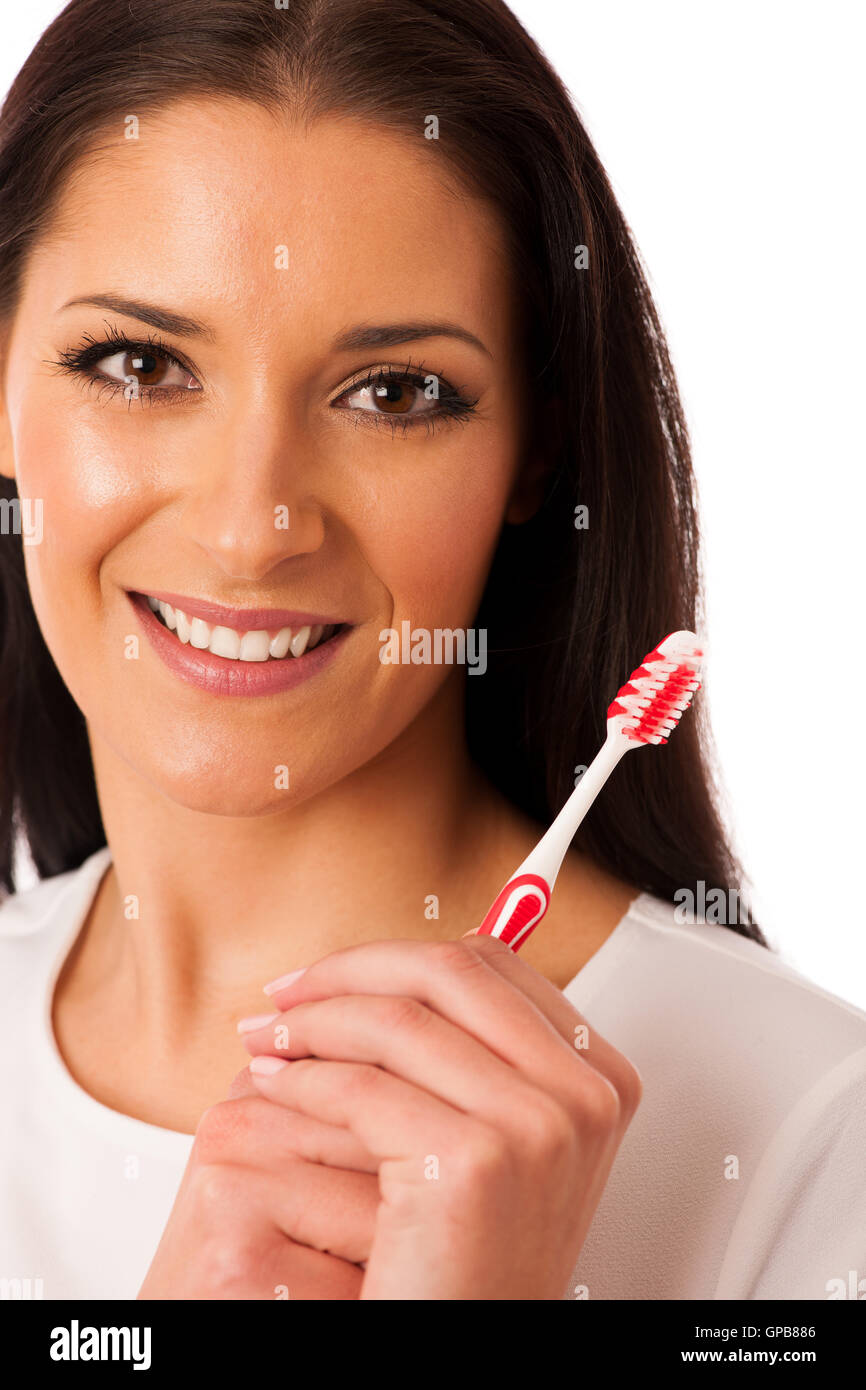 La donna la pulizia dei denti con spazzolino da denti per una perfetta igiene e denti sani. Foto Stock