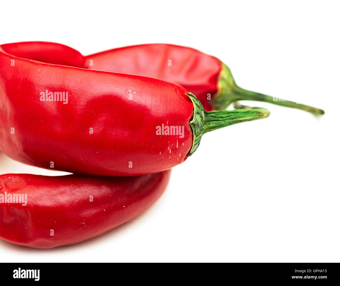 Red hot chili pepper isolato su uno sfondo bianco Foto Stock