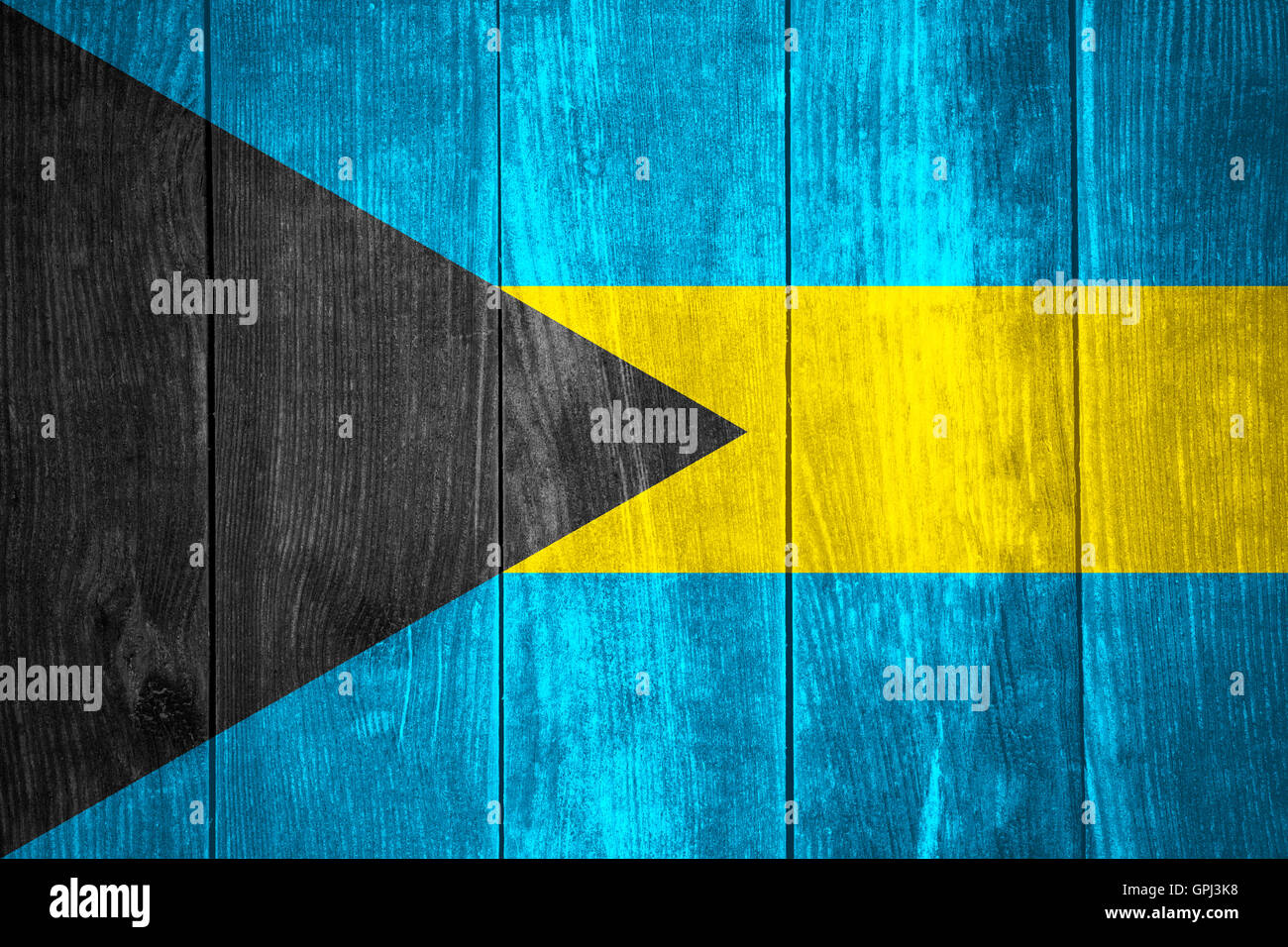 Bandiera delle Bahamas o banner delle Bahamas su sfondo di legno Foto Stock