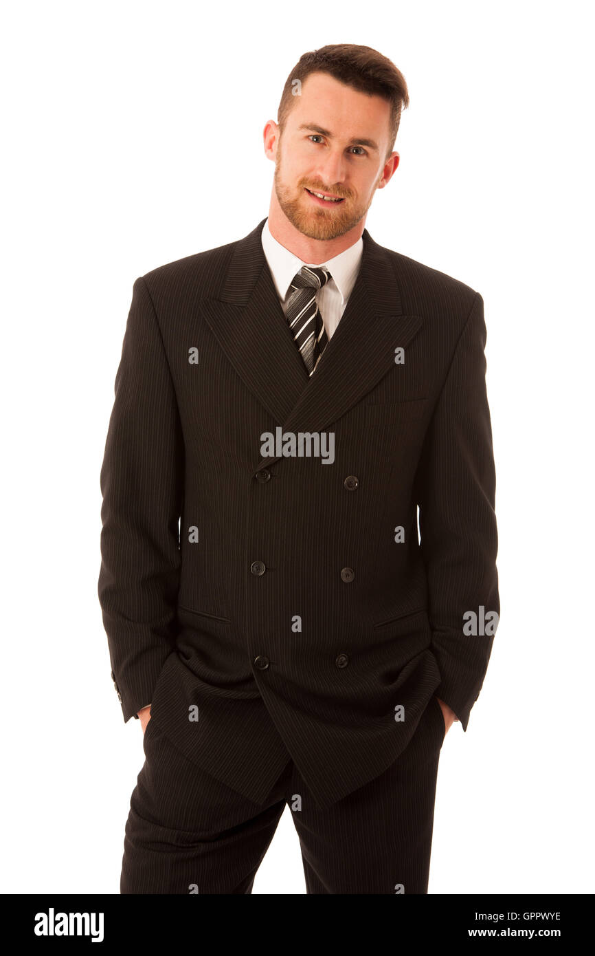 Imprenditore di successo in abito formale con fiducia in piedi isolato su bianco. Foto Stock