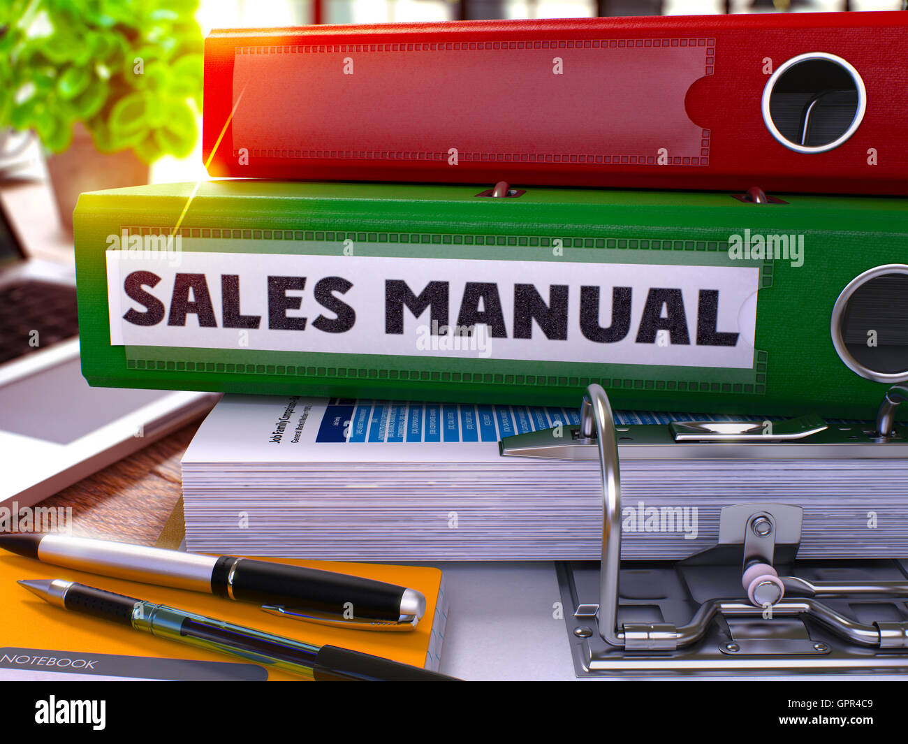 Il manuale di vendita sul verde cartella di Office. Tonica immagine. 3D'illustrazione. Foto Stock