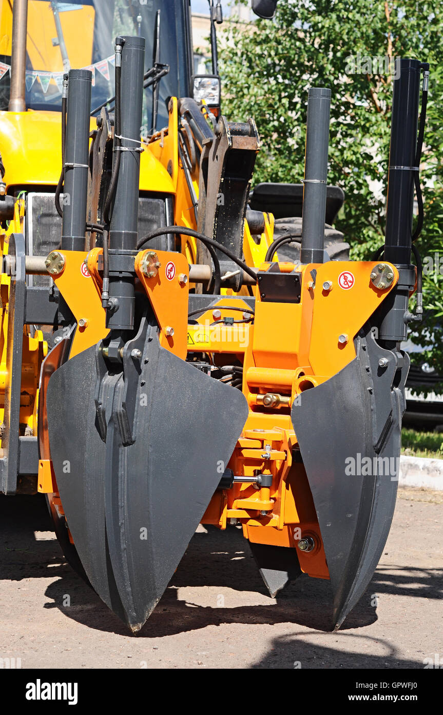 Per impieghi pesanti attrezzature da costruzione parcheggiati in cantiere Foto Stock