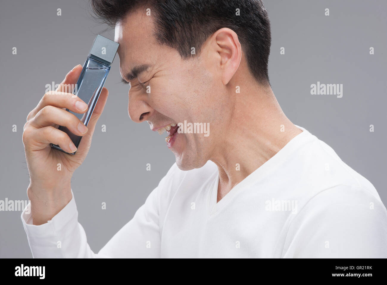Uomo di mezza età con trucco Foto Stock