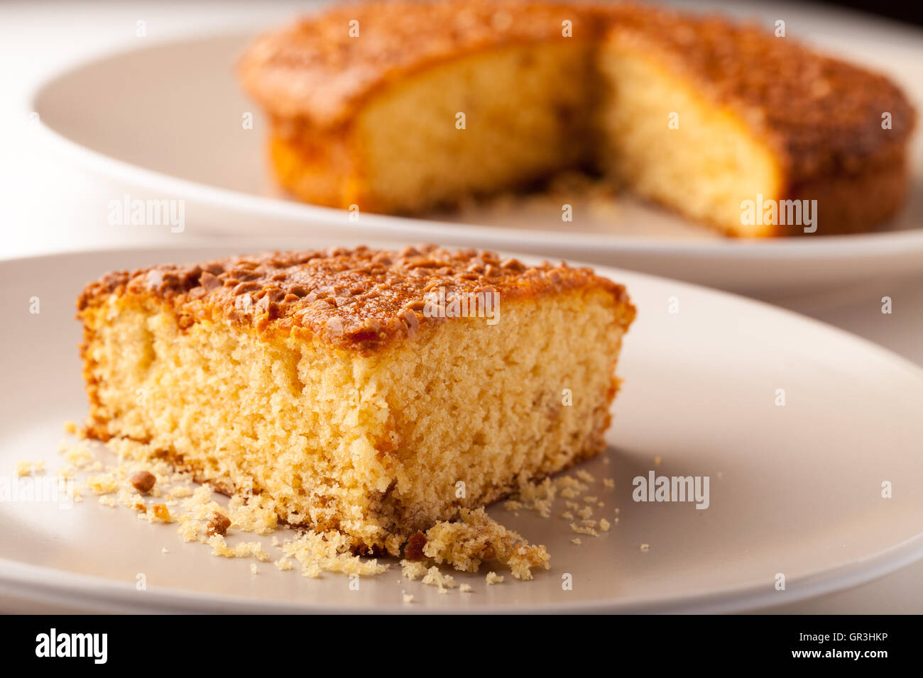 Sciroppo dorato di pan di spagna Foto Stock