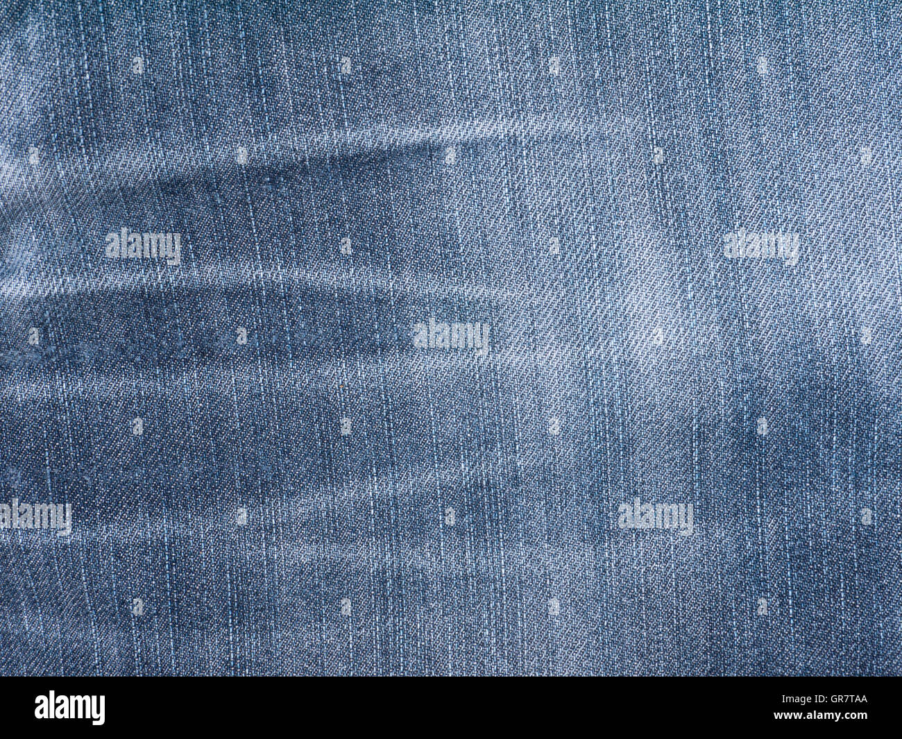 Blu scuro lavati denim stinto sfondo di tessuto Foto Stock