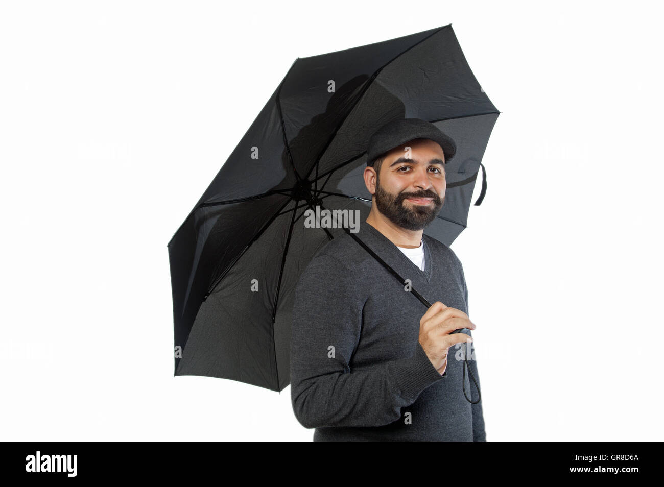 Uomo con ombrello Foto Stock