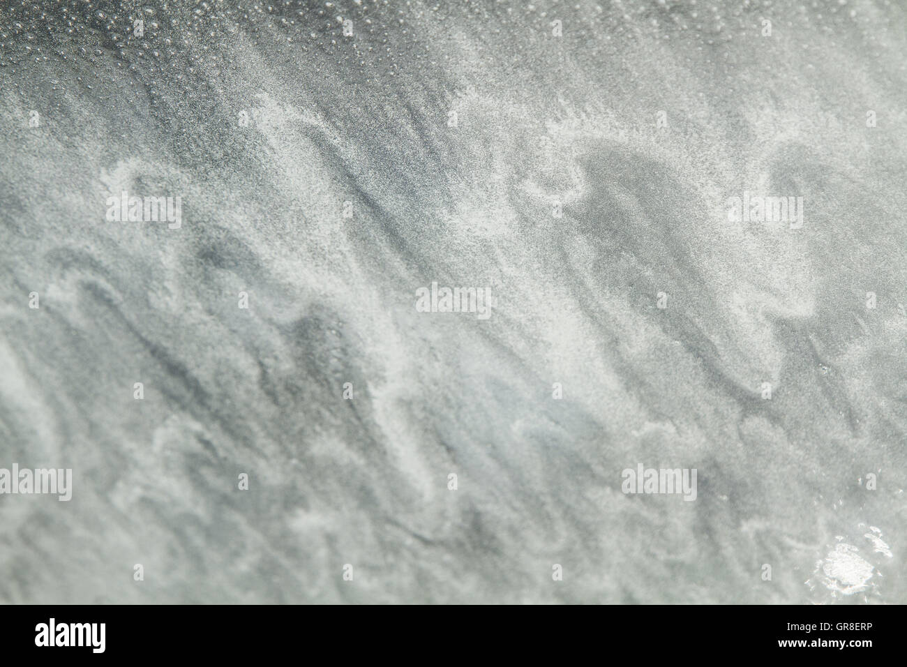 Durante il ciclo di lavaggio nel garage di lavaggio derivano sul parabrezza della vettura vere opere d'arte Foto Stock