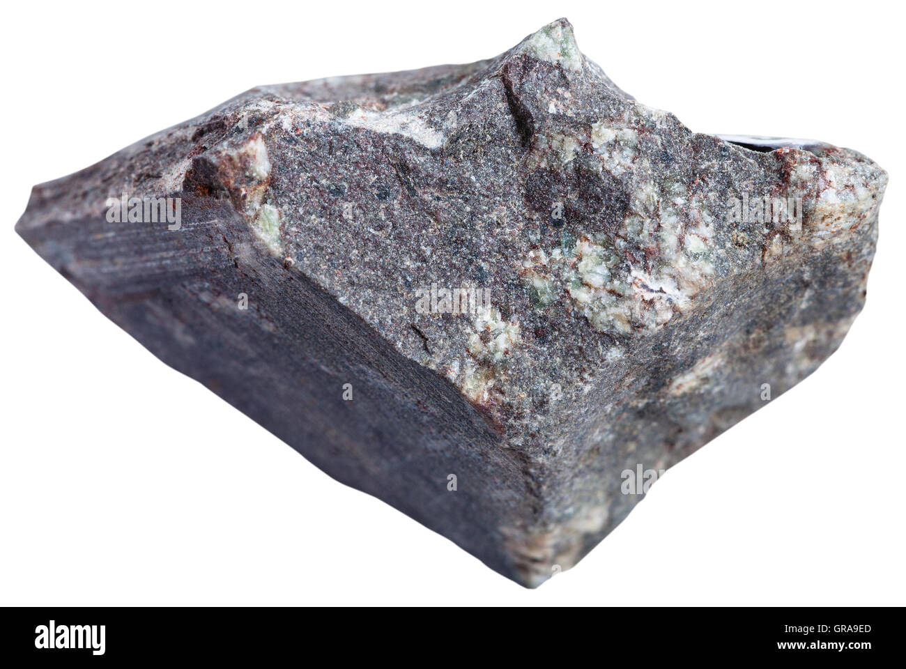 Le riprese in modalità macro della roccia ignea esemplari - porfido basalto (basalto porphyrite) pietra isolato su sfondo bianco Foto Stock