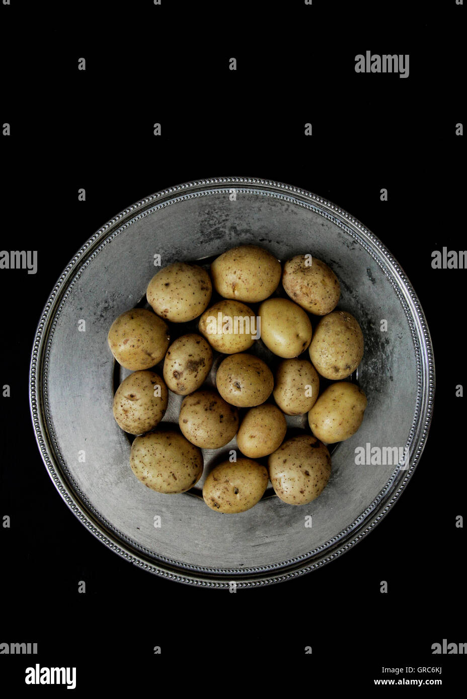 Potato Raccolta di ortaggi Quantità di sementi cibo cucina dieta pelle tempo Foto Stock