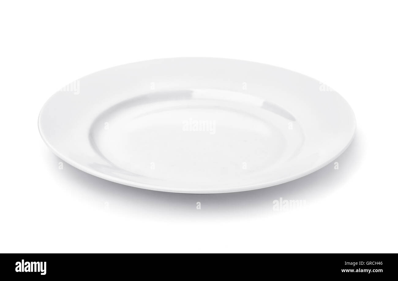 Round bianco vuoto piastra cena isolato su bianco Foto Stock