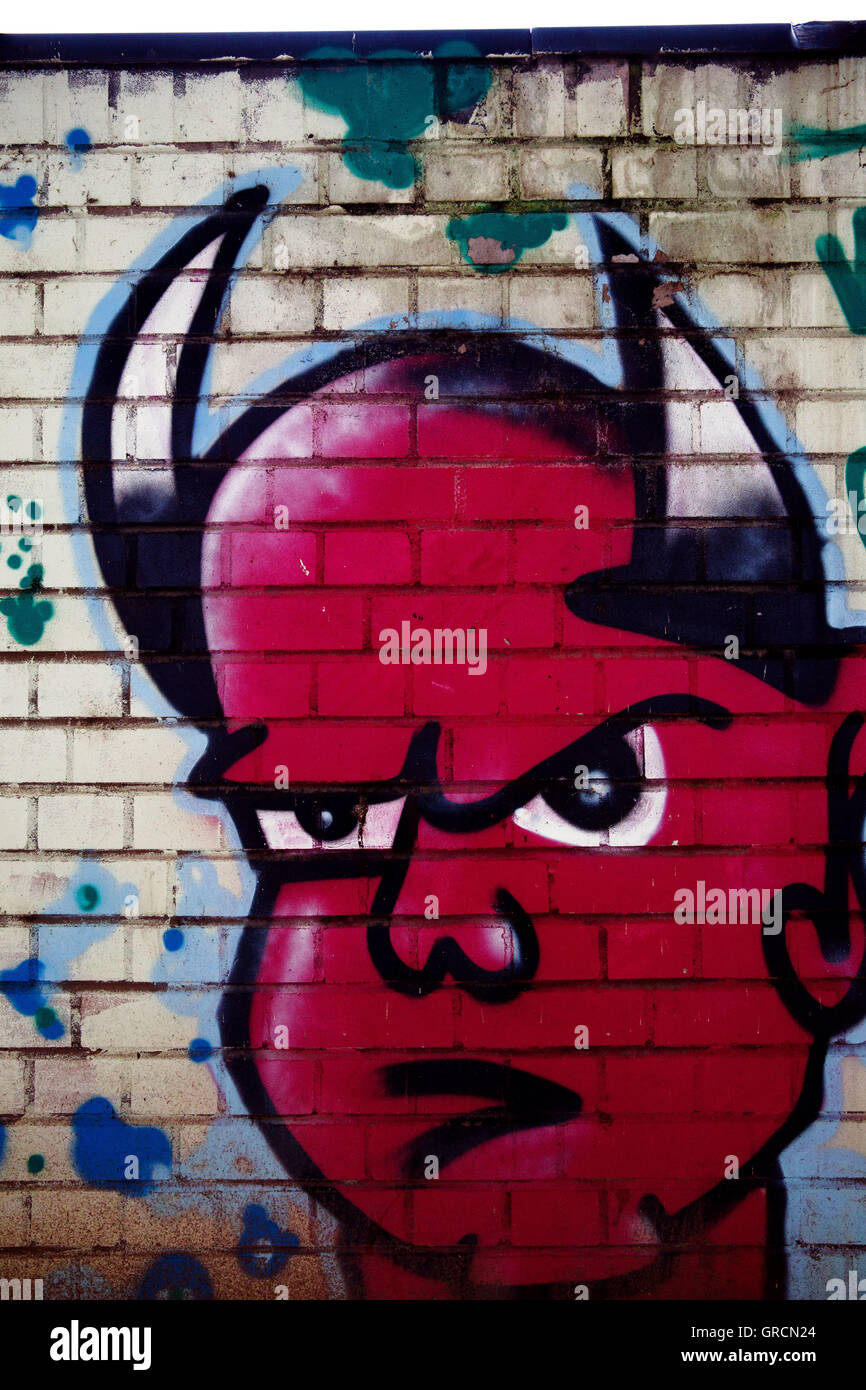 Divertente diavolo faccia, Graffiti Foto Stock