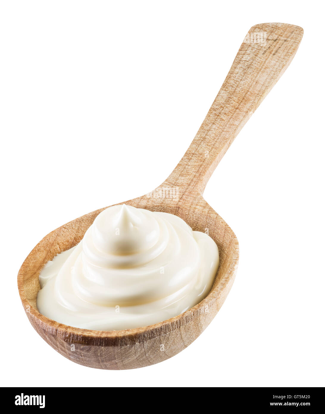 La maionese swirl nel cucchiaio di legno. Il file contiene i tracciati di ritaglio. Foto Stock