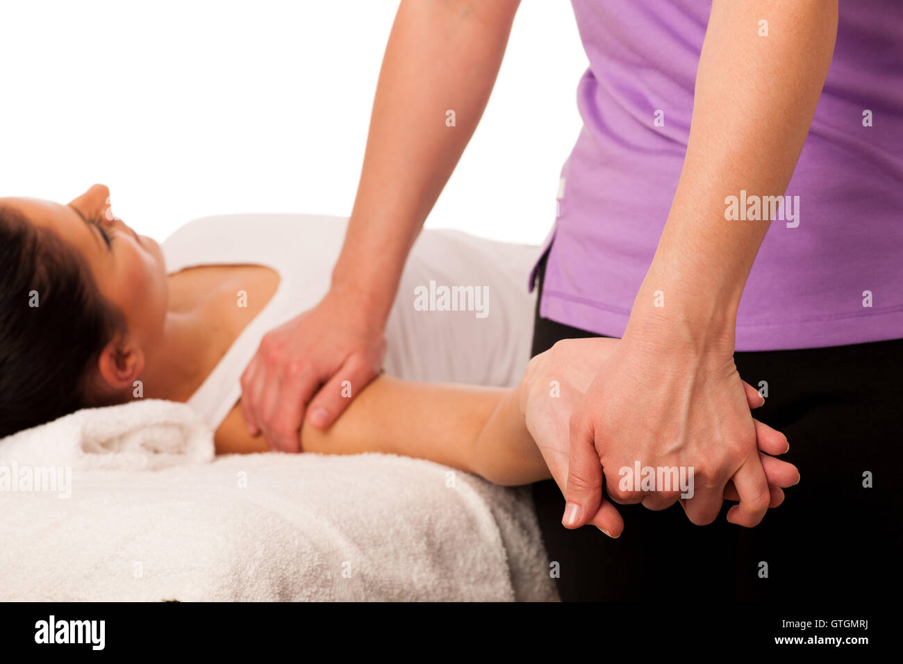 Fisioterapia : terapista excercising con paziente , lavorando su braccio stretching Foto Stock