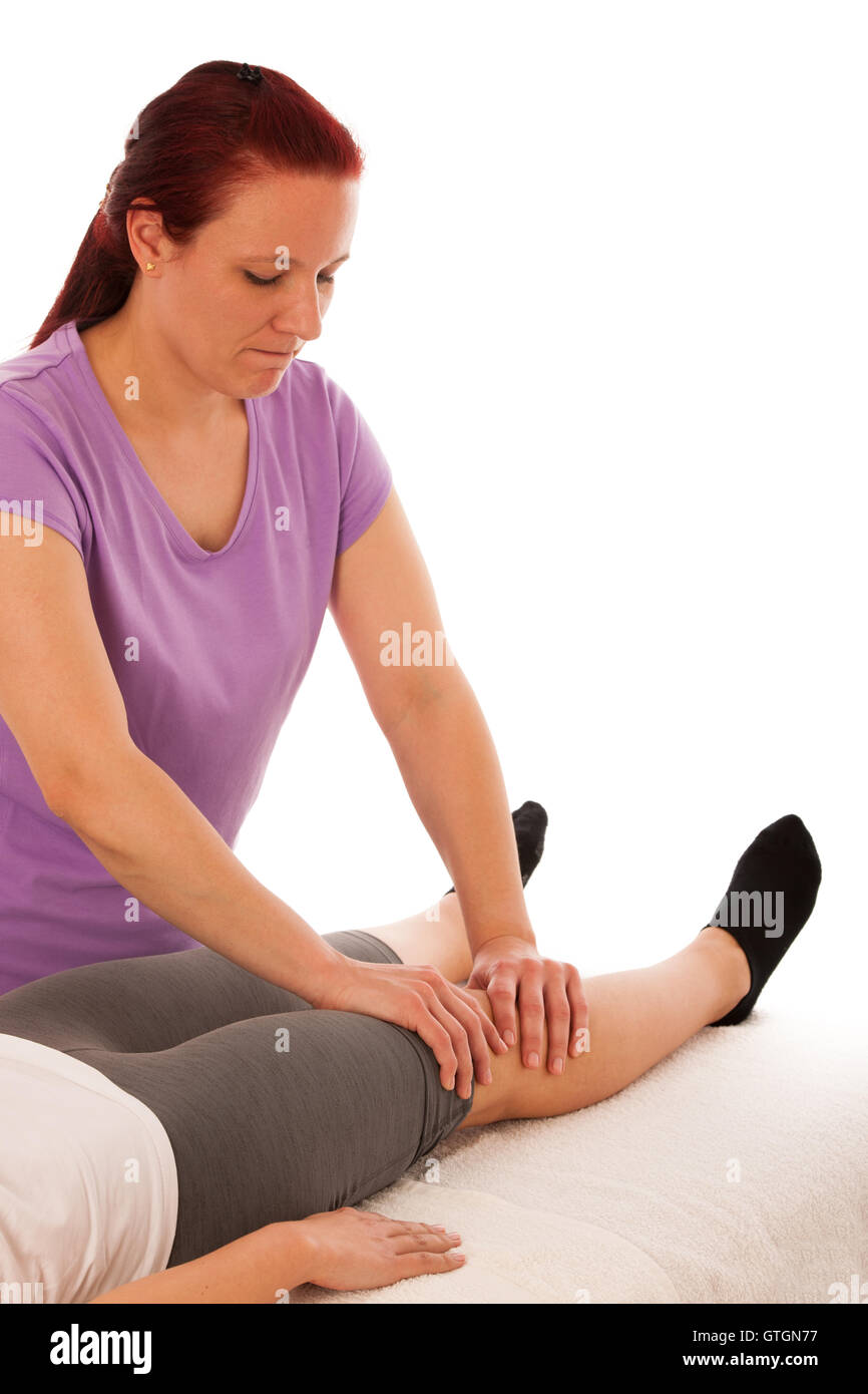Fisioterapia : terapista excercising con paziente , lavorando sulla gamba stretching Foto Stock