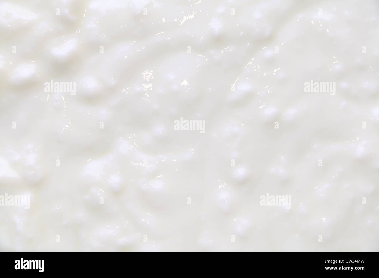 Yogurt bianco sullo sfondo di texture Foto Stock