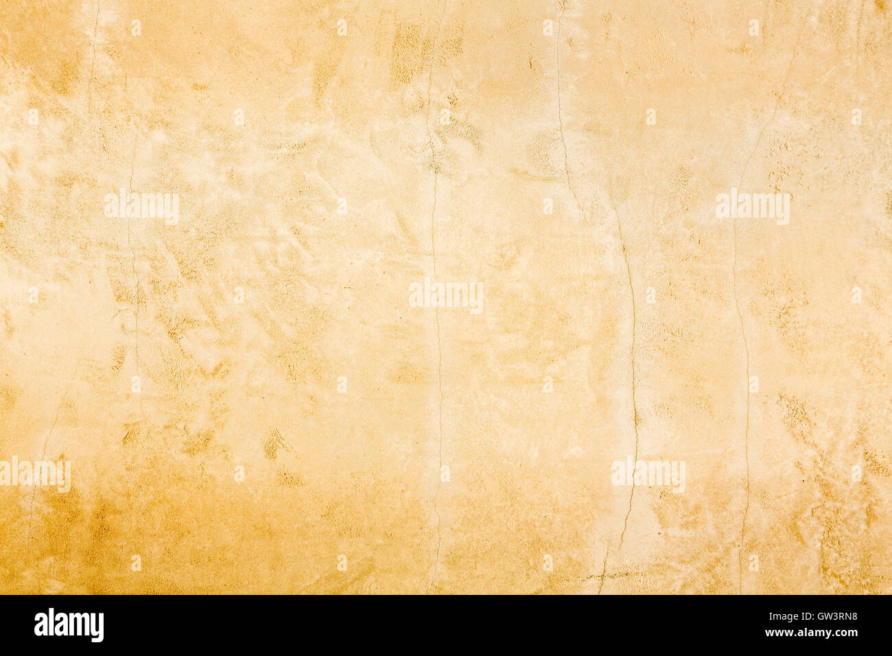 Vecchio rustico invecchiato oro parete in stucco distressed texture di sfondo Foto Stock