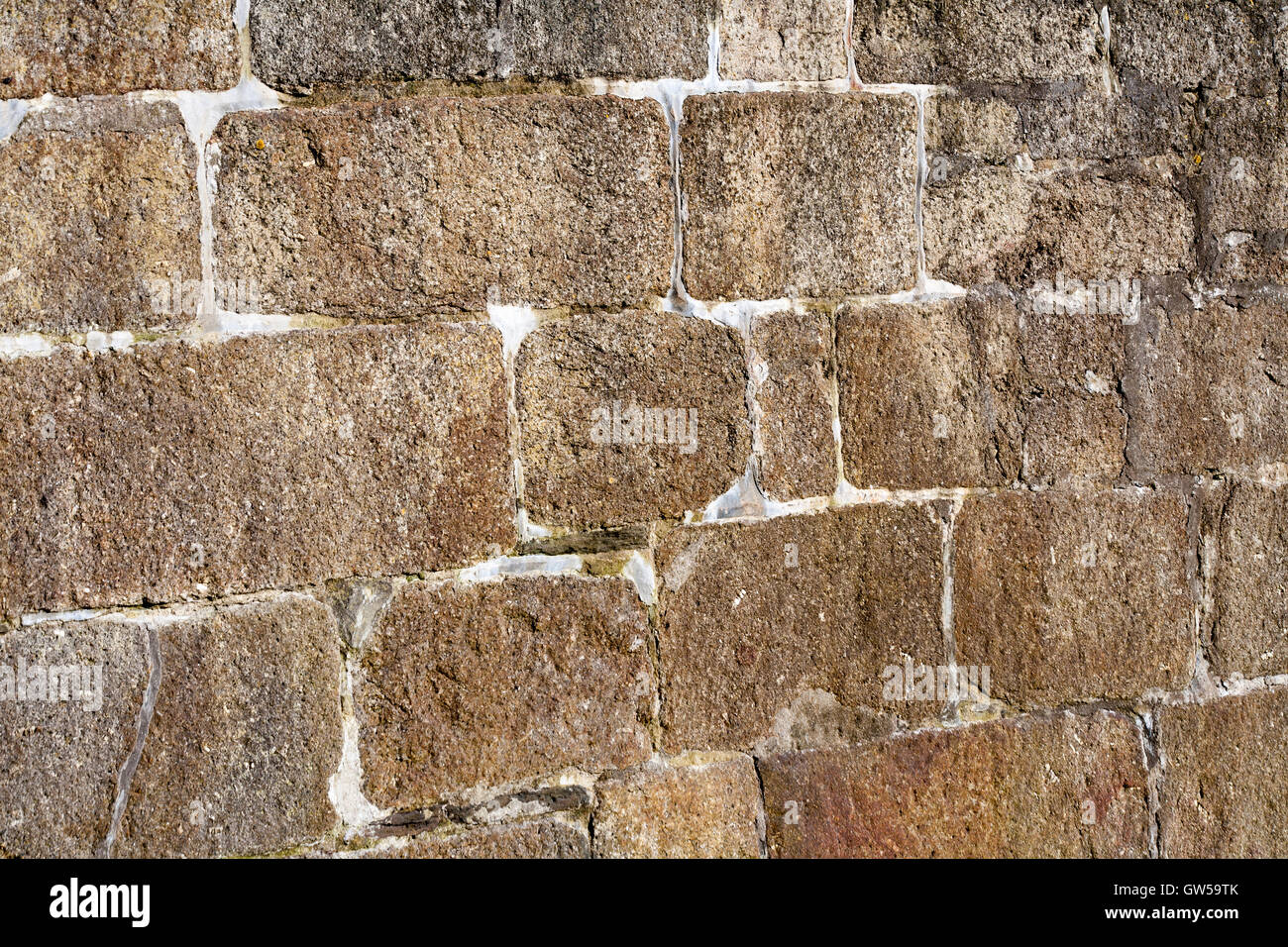 Full Frame Texture di sfondo il granito della Cornovaglia blocco di pietra autentica parete orizzontale a spiovente Foto Stock