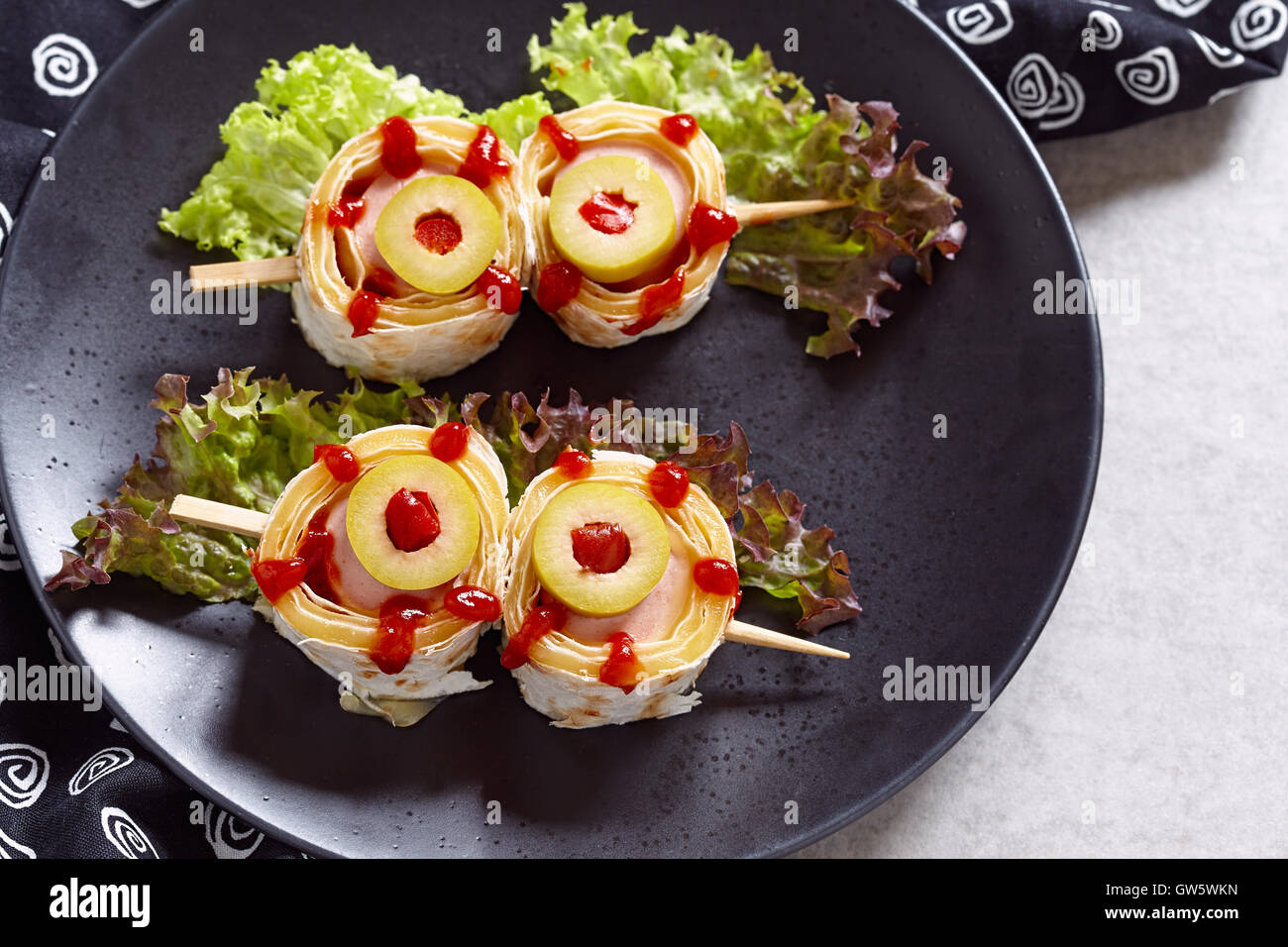 Le sfere di occhio su bastoni per la festa di Halloween Foto Stock