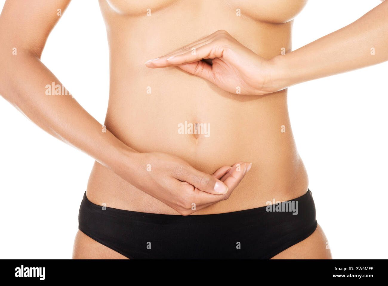 Montare e sottile per la giovane donna pancia Foto Stock