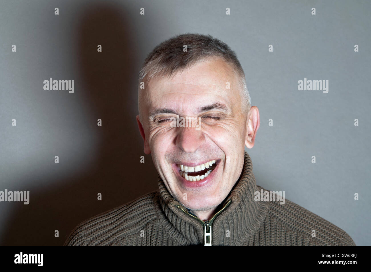 Uomo di risata Foto Stock