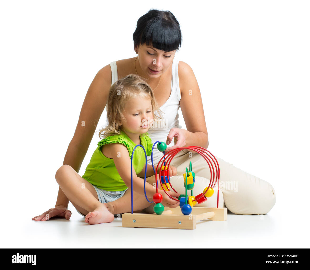 Kid e madre giocando con il giocattolo educativo Foto Stock