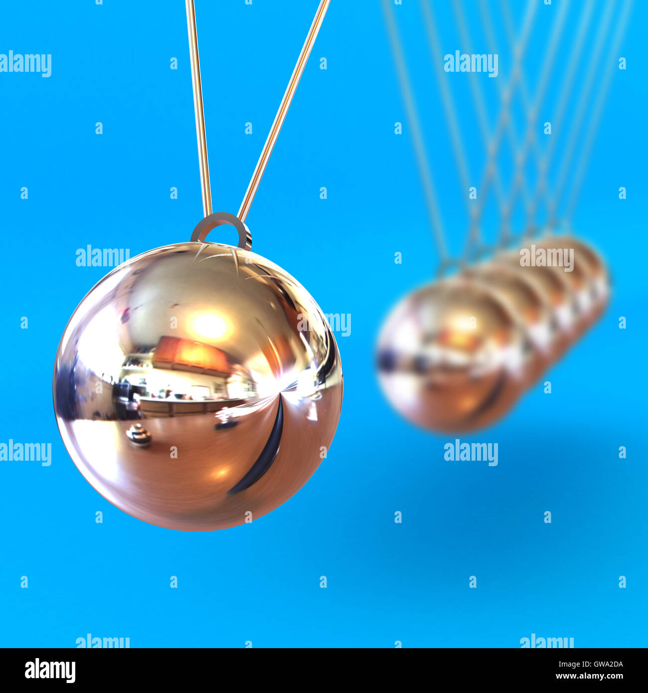 Newton culla contro uno sfondo blu Foto Stock