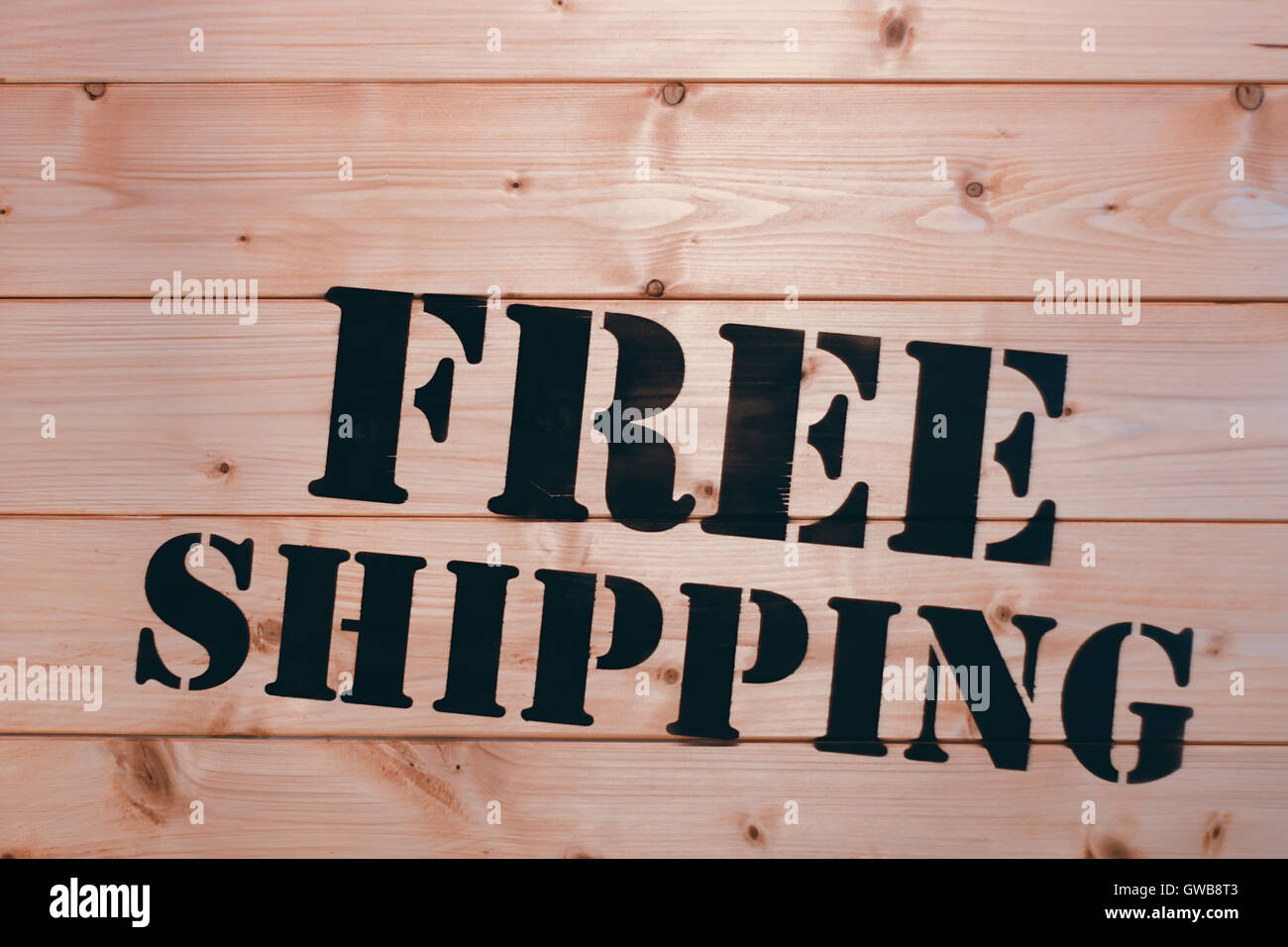 Spedizione gratuita. Spedizione gratuita in parola su legno scatola di trasporto. Spedizione gratuita Pacchetto. Foto Stock