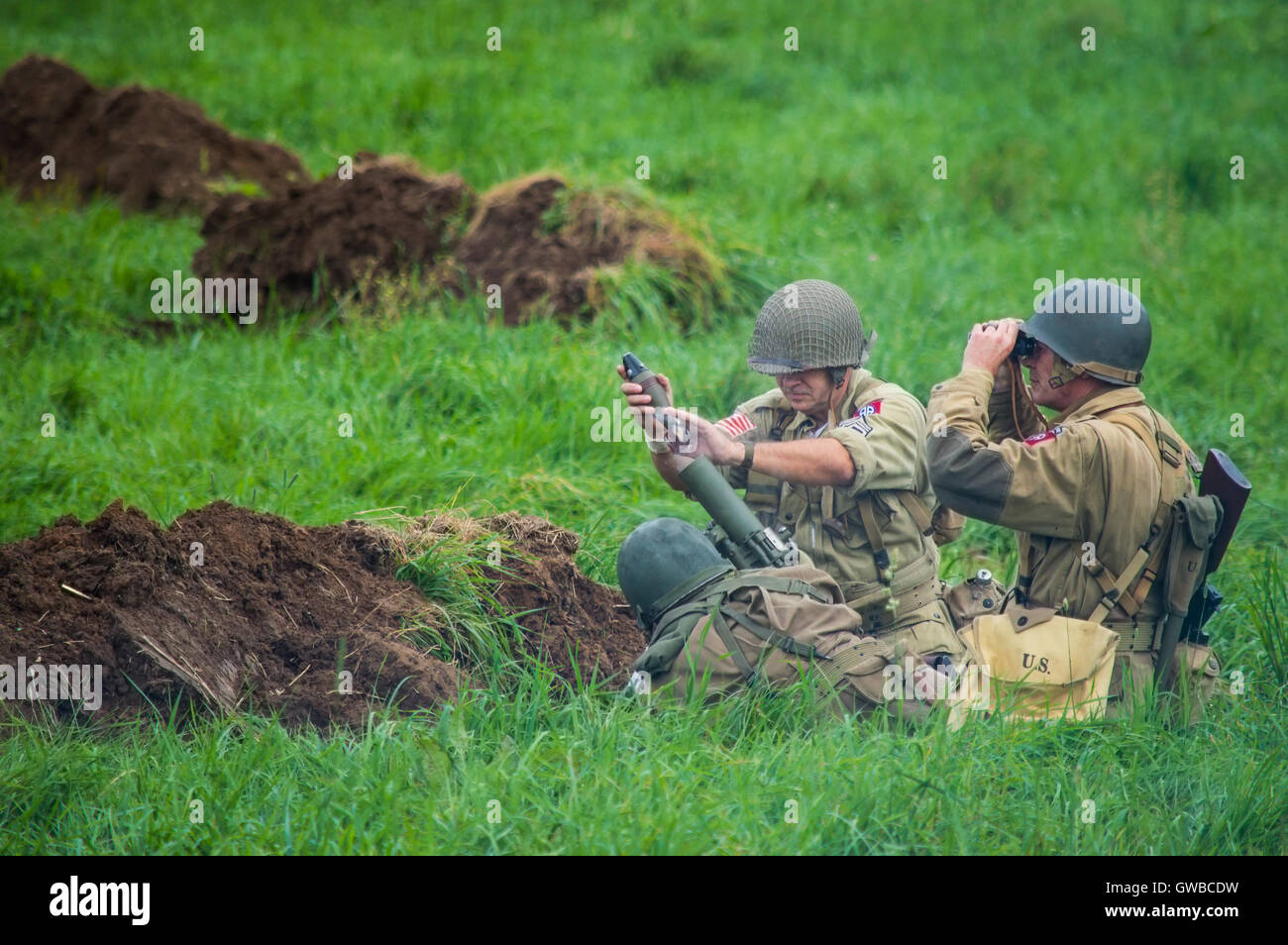 US Army ottantaduesima Airborne team di malta la cottura di una shell. Foto Stock