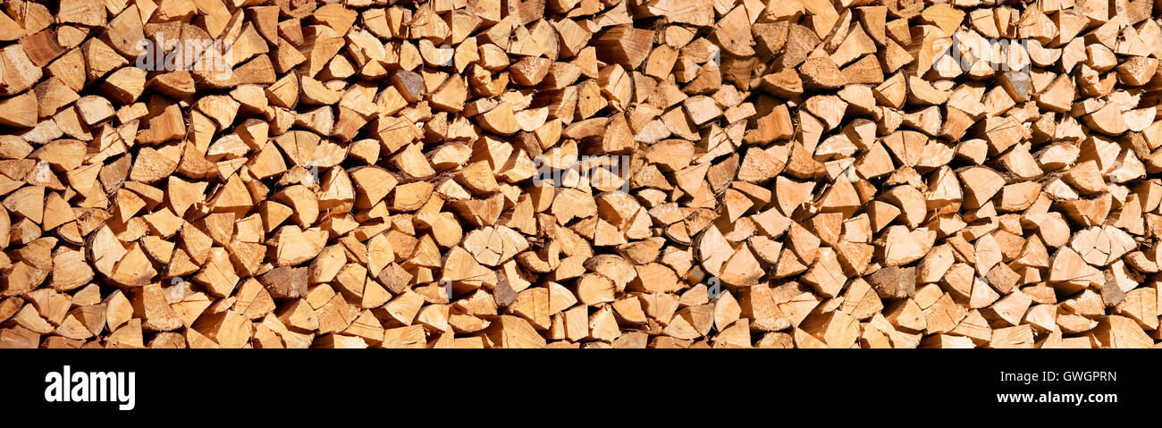 Pila di ciocchi di legna, la testata in legno sfondo astratto Foto Stock