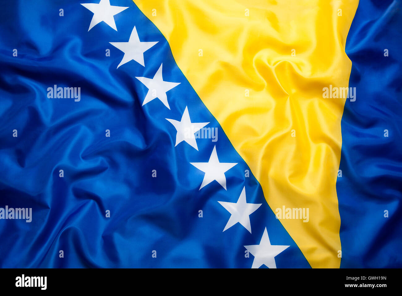 Bandiera tessile della Bosnia ed Erzegovina per lo sfondo Foto Stock