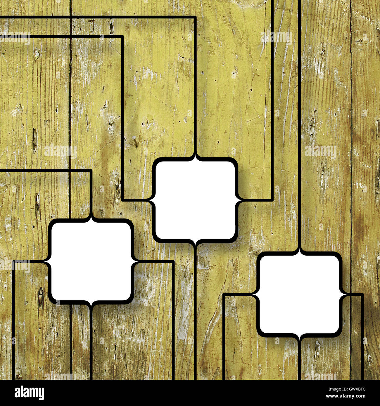 Close-up di tre quadrato nero fustellato cornici collegate insieme su giallo antico alterate di tavole di legno sfondo Foto Stock