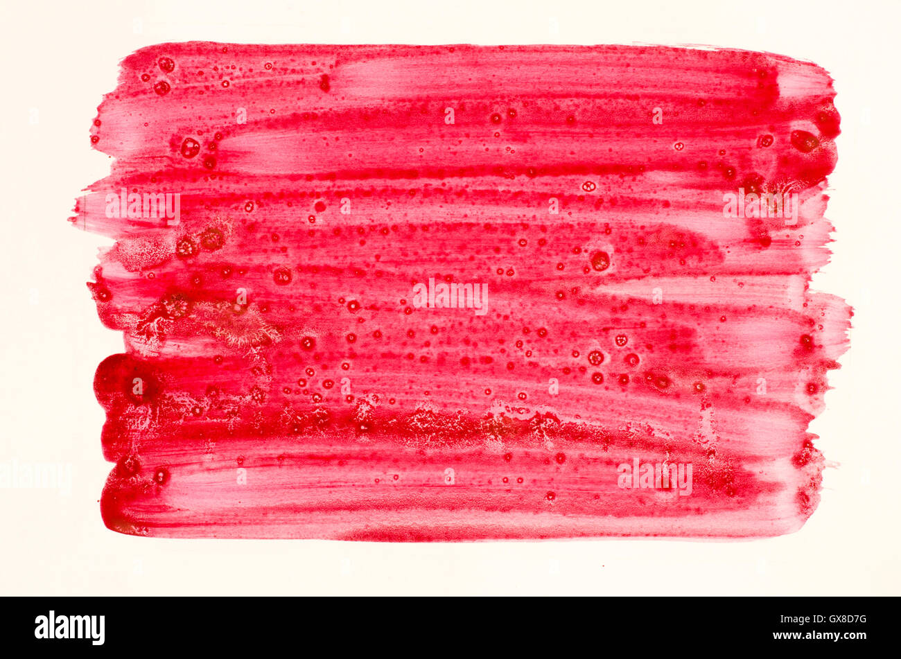Colore rosso texture ad acquarello dipinto sul libro bianco sullo sfondo Foto Stock