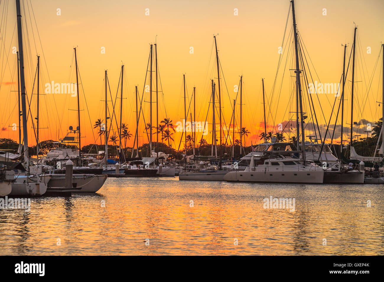 Porto di Honolulu al tramonto Foto Stock