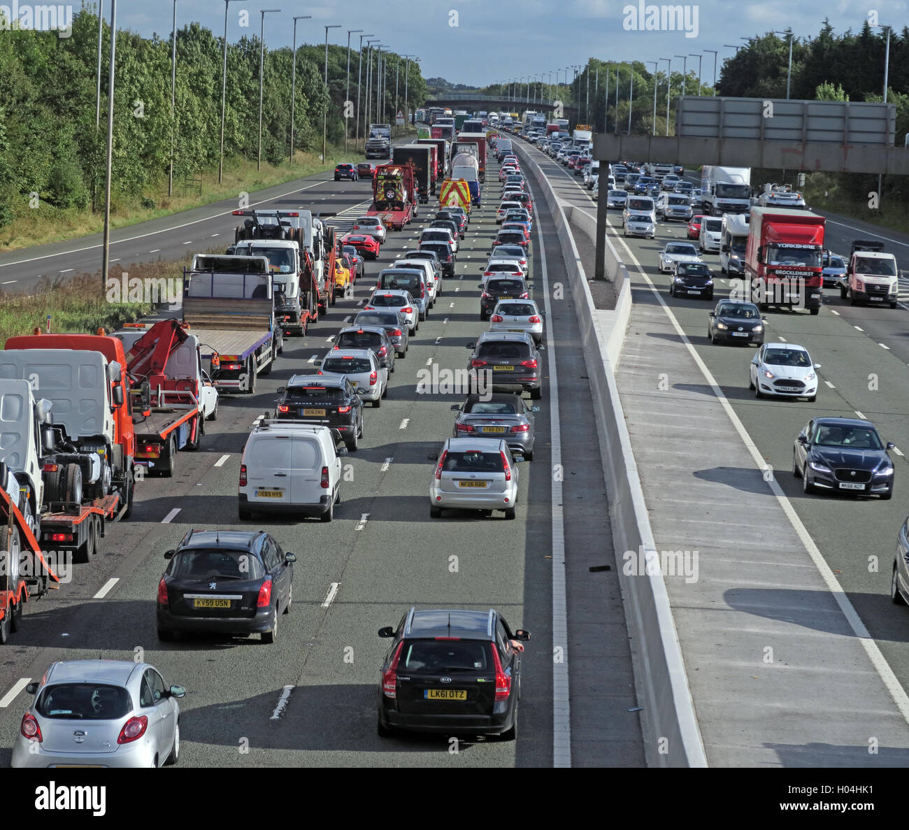 La congestione del traffico,marmellate sulla autostrada M6,WARRINGTON,CHESHIRE, Inghilterra, Regno Unito Foto Stock