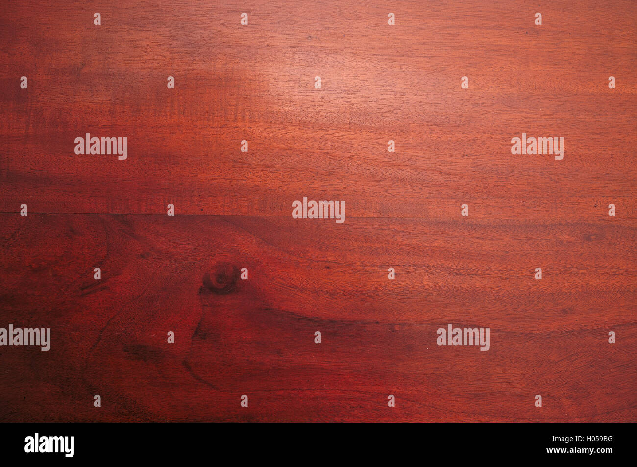 In legno di mogano superficie. Gli sfondi e le texture Foto Stock