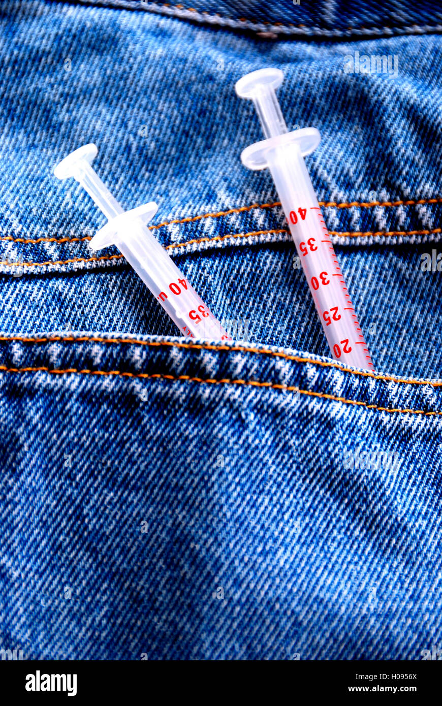 Jeans e siringhe, tossicodipendente di concetto Foto Stock